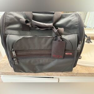 TUMI travel case in great shape and highly resistant material.